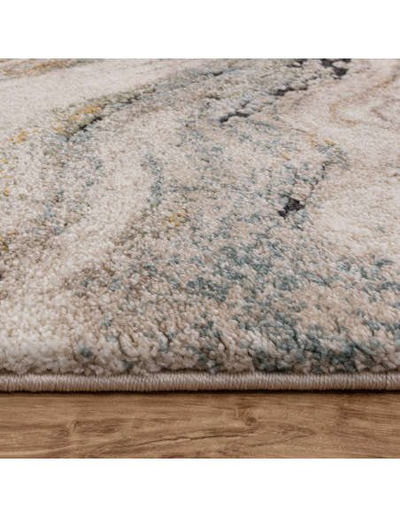 Add elegance and comfort to any room with the Mirage Wave Blue shaggy rug, featuring a plush texture and abstract wave design f