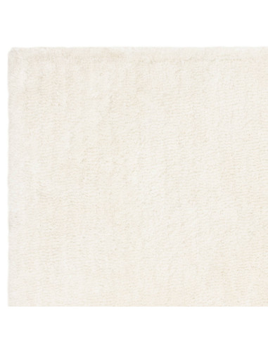 Experience luxurious softness and timeless elegance with the Opulence Ivory shaggy rug, perfect for adding warmth and style to
