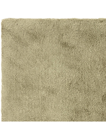 Add warmth and style with the Opulence Sage shaggy rug, featuring a plush hand-tufted texture and durable, easy-care synthetic