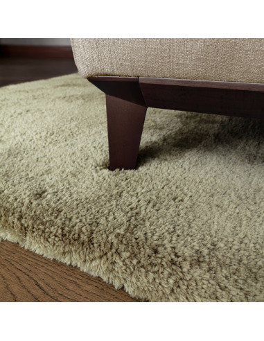Add warmth and style with the Opulence Sage shaggy rug, featuring a plush hand-tufted texture and durable, easy-care synthetic
