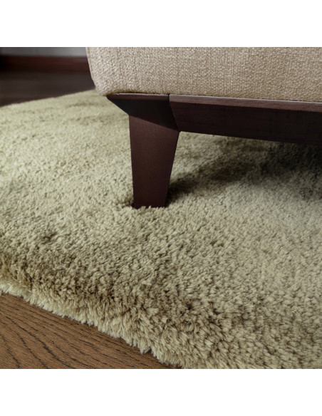 Add warmth and style with the Opulence Sage shaggy rug, featuring a plush hand-tufted texture and durable, easy-care synthetic