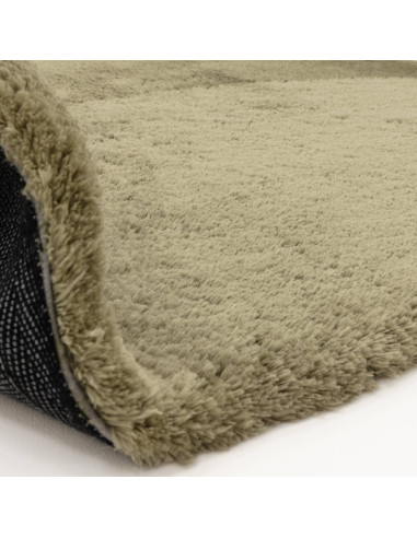 Add warmth and style with the Opulence Sage shaggy rug, featuring a plush hand-tufted texture and durable, easy-care synthetic