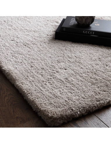 Experience ultimate comfort and modern elegance with the Opulence Silver shaggy rug, featuring plush softness and durable hand-