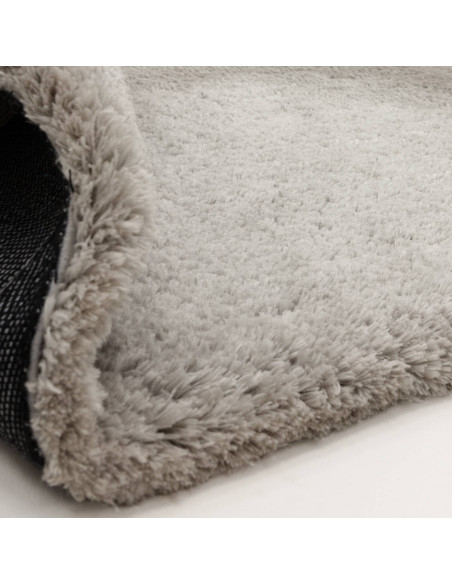 Experience ultimate comfort and modern elegance with the Opulence Silver shaggy rug, featuring plush softness and durable hand-