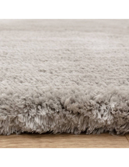 Experience ultimate comfort and modern elegance with the Opulence Silver shaggy rug, featuring plush softness and durable hand-