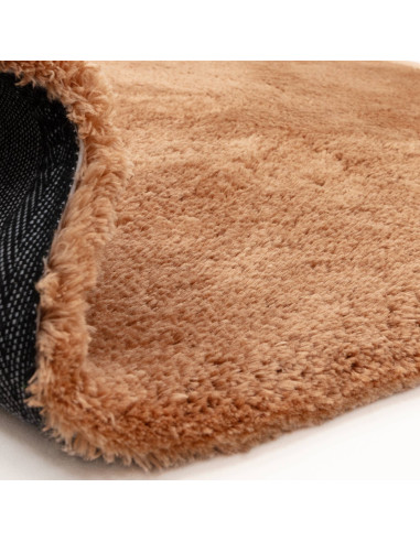 Experience luxurious softness with the Opulence Terra shaggy rug, featuring a warm terra tone and plush texture perfect for any