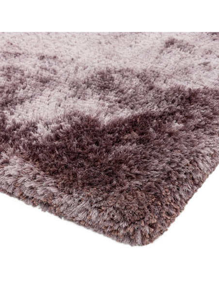 Add warmth and elegance with the Plush Dusk shaggy rug, featuring a luxurious hand-made texture and durable, easy-care polyeste