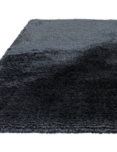 Add plush comfort and deep navy elegance to any room with this durable, easy-care shaggy rug—perfect for stylish, cozy living s