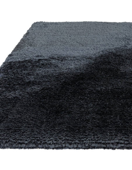 Add plush comfort and deep navy elegance to any room with this durable, easy-care shaggy rug—perfect for stylish, cozy living s