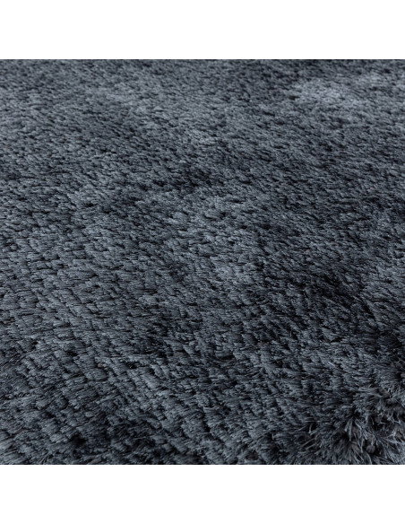 Add plush comfort and deep navy elegance to any room with this durable, easy-care shaggy rug—perfect for stylish, cozy living s