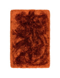Tappeto Plush Rust a pelo lungo, morbido e caldo, perfetto per ogni ambiente. Design artigianale e colori avvolgenti per un com