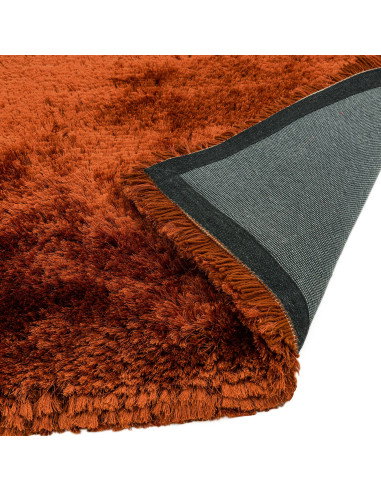 Add warmth and luxury to any room with the Plush Rust shaggy rug—soft, durable, and hand-made for lasting comfort and style.