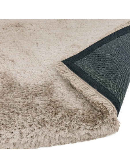 Add warmth and comfort with the Plush Sand shaggy rug, featuring a soft texture and durable design perfect for any modern or cl