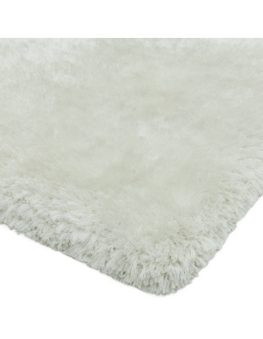 Experience ultimate comfort and style with the Plush White shaggy rug—soft, durable, and perfect for adding elegance to any roo