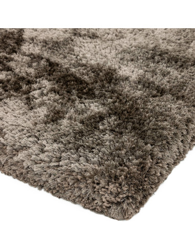 Experience ultimate comfort and style with the Plush Zinc shaggy rug, featuring soft texture and elegant neutral tones for any