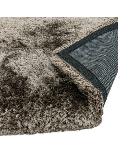 Experience ultimate comfort and style with the Plush Zinc shaggy rug, featuring soft texture and elegant neutral tones for any