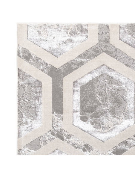 Elevate your space with the Aurora AU12 Crystal, a modern luxury rug featuring a silk look finish and a stunning geometric desi