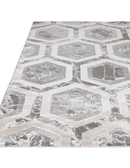 Elevate your space with the Aurora AU12 Crystal, a modern luxury rug featuring a silk look finish and a stunning geometric desi