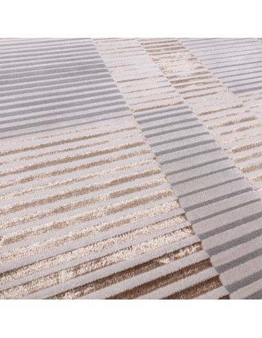 Tappeto Aurora AU14 Ripple: design geometrico e lucido, perfetto per ambienti moderni eleganti. Resistente, facile da pulire e