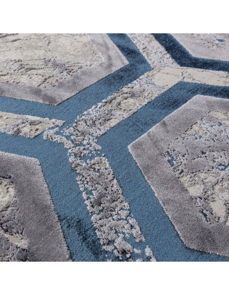 Elevate your space with the Aurora Hexagon AU19, a modern luxury rug featuring a lustrous, silk-look finish and durable, easy-c