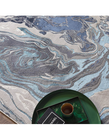 Tappeto Aurora Ocean AU18: design lucido e moderno, fantasia astratta e colori raffinati per un ambiente elegante e luminoso.
