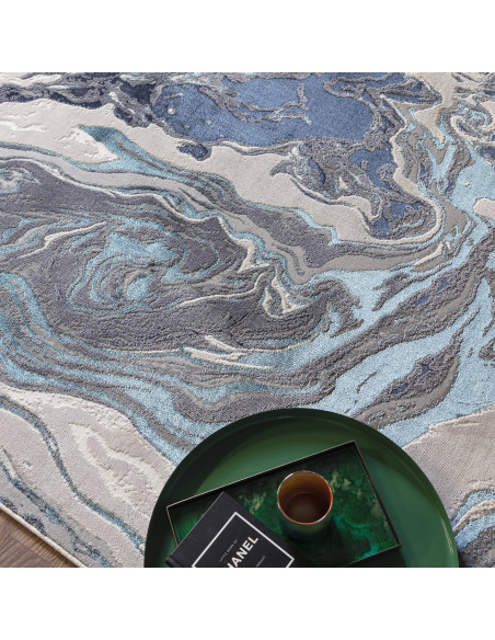 Tappeto Aurora Ocean AU18: design lucido e moderno, fantasia astratta e colori raffinati per un ambiente elegante e luminoso.