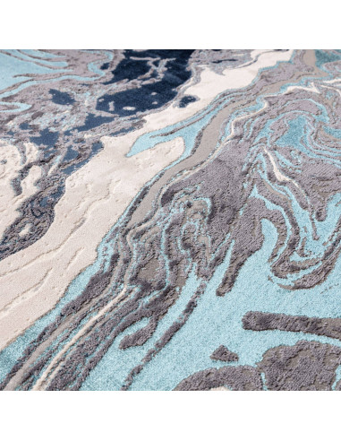 Tappeto Aurora Ocean AU18: design lucido e moderno, fantasia astratta e colori raffinati per un ambiente elegante e luminoso.