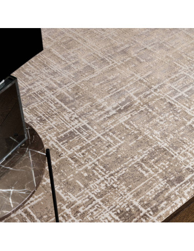 Elevate your space with the Kuza Abstract Beige rug, a modern luxury rug featuring a subtle lustre and silk look for lasting el