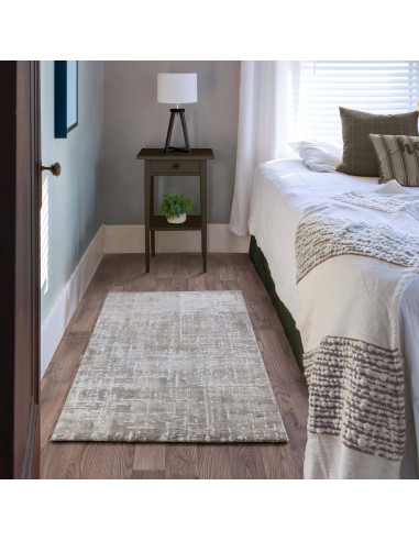Elevate your space with the Kuza Abstract Beige rug, a modern luxury rug featuring a subtle lustre and silk look for lasting el