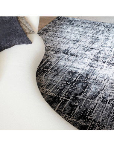Tappeto Kuza Abstract Black: design moderno elegante con motivo astratto, materiali resistenti e facile manutenzione. Perfetto