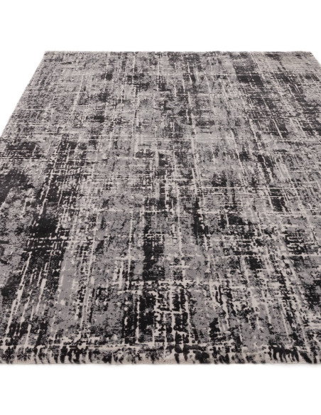Tappeto Kuza Abstract Black: design moderno elegante con motivo astratto, materiali resistenti e facile manutenzione. Perfetto