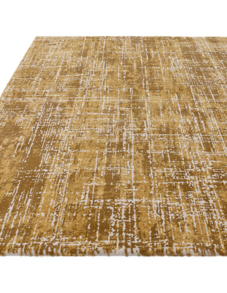 Tappeto Kuza Abstract Gold: design moderno elegante con effetto luminoso, morbido e resistente, perfetto per ambienti raffinati