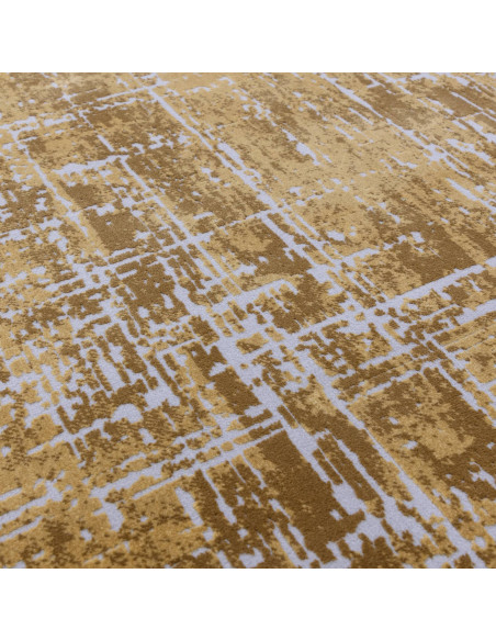 Elevate your space with the Kuza Abstract Gold rug, a modern luxury rug featuring a lustrous, silk-look finish and durable, eas