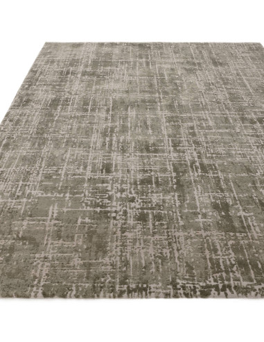 Elevate your space with the Kuza Abstract Green rug, a modern luxury rug featuring a silk look finish and durable, easy-care sy