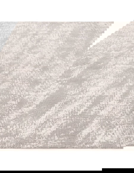 Discover the Kuza Abstract Grey rug, a modern luxury rug with a subtle silk look finish that adds elegance and durability to an