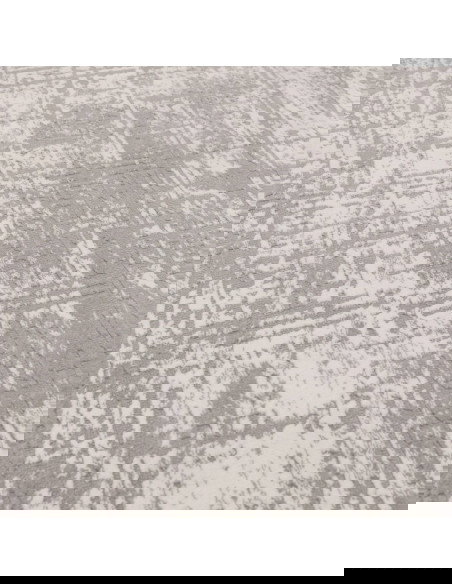Discover the Kuza Abstract Grey rug, a modern luxury rug with a subtle silk look finish that adds elegance and durability to an