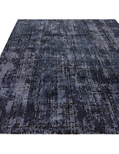 Elevate your home with the Kuza Abstract Navy, a modern luxury rug featuring a silk look and rich navy tones for lasting elegan