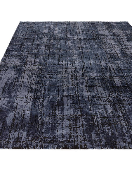Elevate your home with the Kuza Abstract Navy, a modern luxury rug featuring a silk look and rich navy tones for lasting elegan