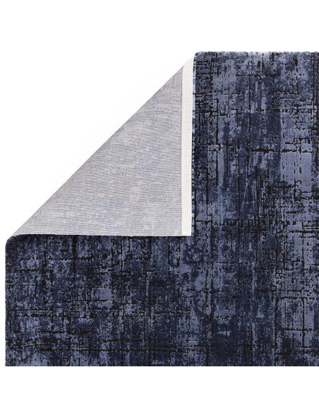 Elevate your home with the Kuza Abstract Navy, a modern luxury rug featuring a silk look and rich navy tones for lasting elegan