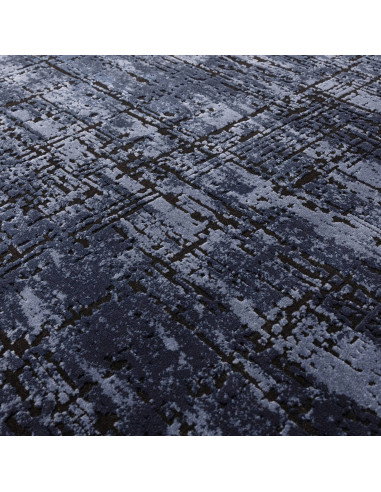 Elevate your home with the Kuza Abstract Navy, a modern luxury rug featuring a silk look and rich navy tones for lasting elegan