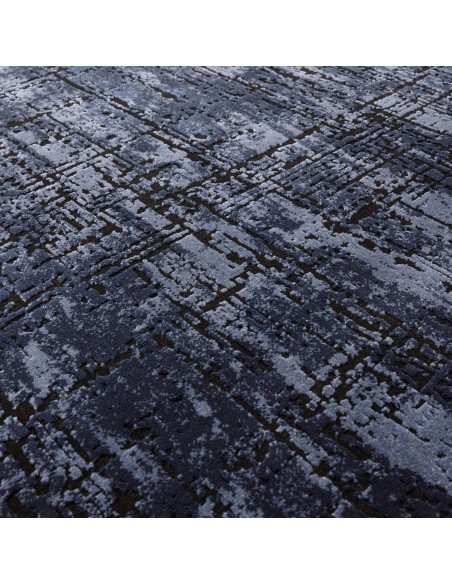Elevate your home with the Kuza Abstract Navy, a modern luxury rug featuring a silk look and rich navy tones for lasting elegan