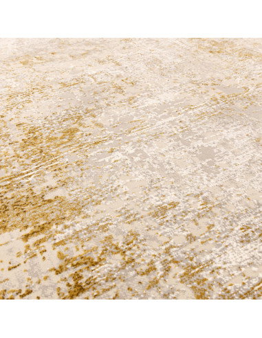 Elevate your space with the Kuza Border Gold rug, a durable modern luxury rug featuring a lustrous silk look and a rich golden