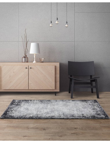 Discover the Kuza Border Grey rug, a modern luxury rug with a subtle silk look, blending durability and elegant shine for any s