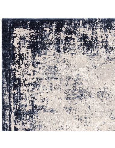 Elevate your space with the Kuza Border Navy rug, a modern luxury rug featuring a subtle lustre and silk look for timeless eleg