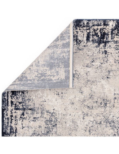 Elevate your space with the Kuza Border Navy rug, a modern luxury rug featuring a subtle lustre and silk look for timeless eleg