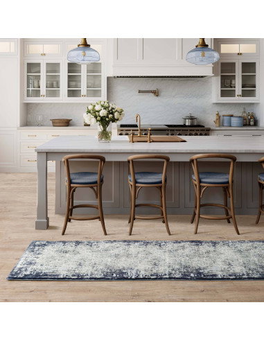 Elevate your space with the Kuza Border Navy rug, a modern luxury rug featuring a subtle lustre and silk look for timeless eleg