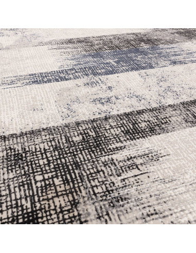 Tappeto moderno elegante Kuza Lines Blue con motivo astratto, effetto seta e design lucido, perfetto per ambienti contemporanei