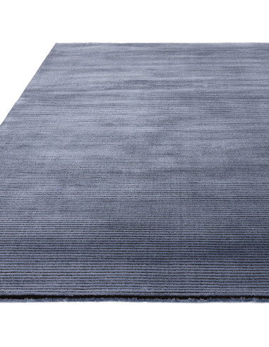 Elevate your space with the Kuza Plain Stripe Navy rug, a modern luxury rug featuring a silk look finish and plush, durable des