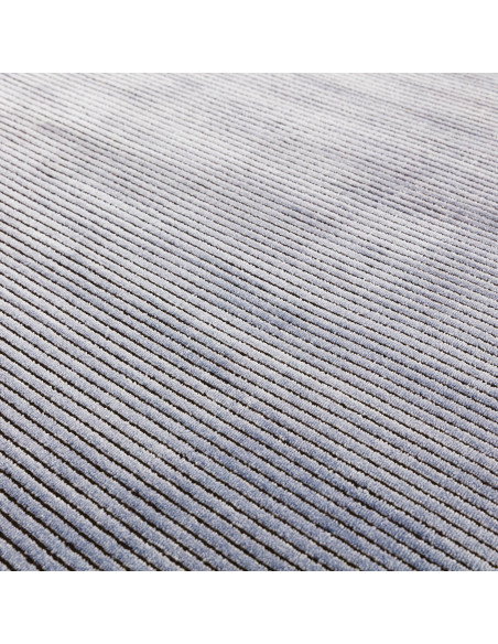 Elevate your space with the Kuza Plain Stripe Navy rug, a modern luxury rug featuring a silk look finish and plush, durable des