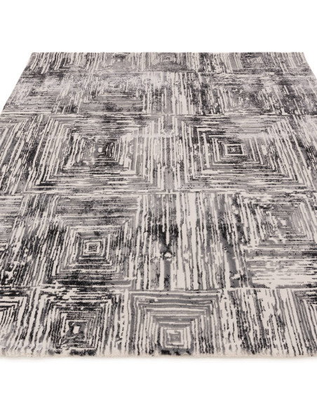 Discover the Kuza Portrait Grey rug, a modern luxury rug with a geometric stripe design and a soft, shiny silk look perfect for
